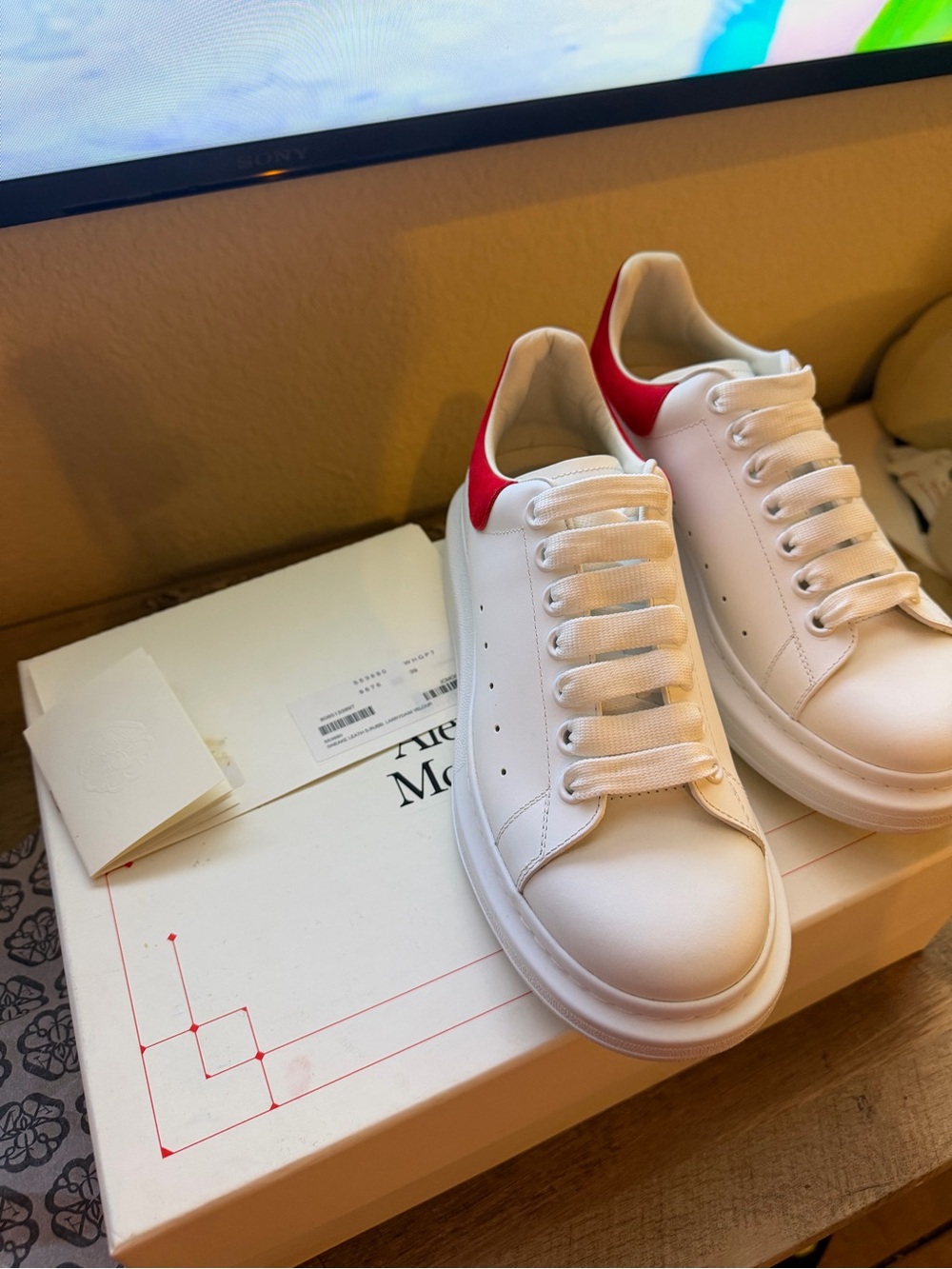 Alexander McQueen White Sneakers with Red Heel Tab
